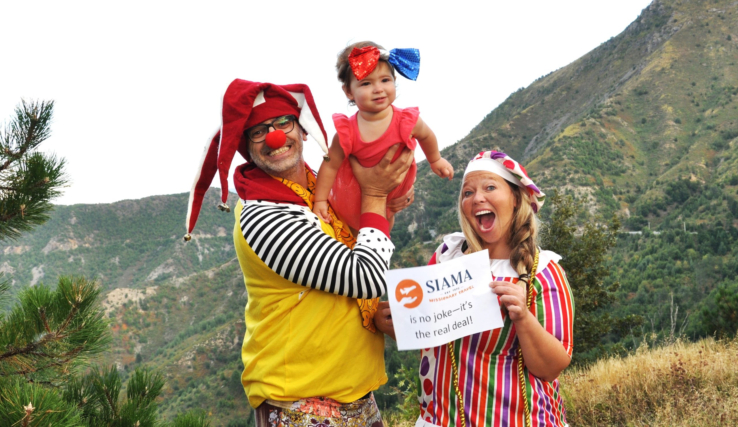 A family dressed up as clowns