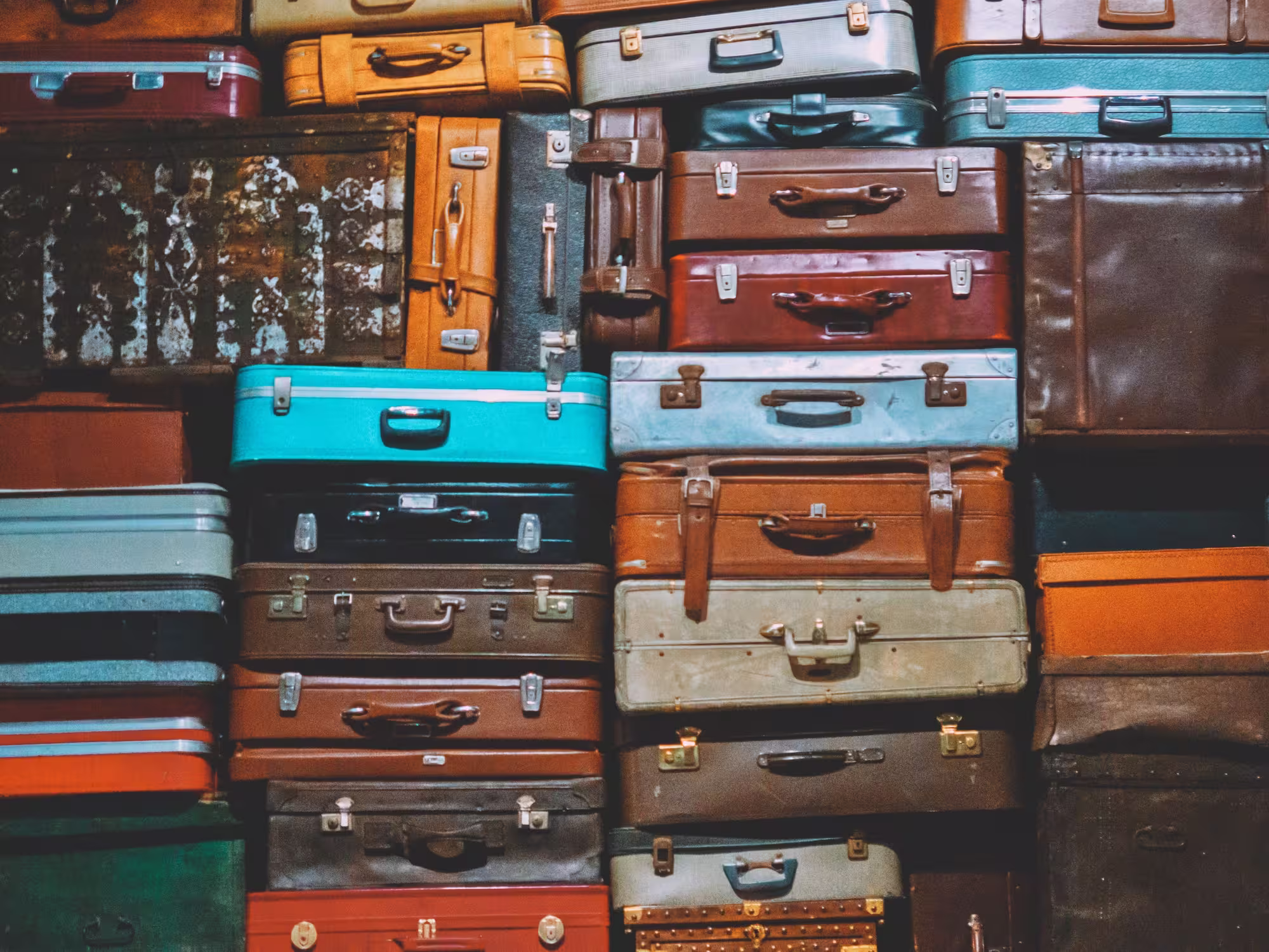 piles of suitcases and baggage