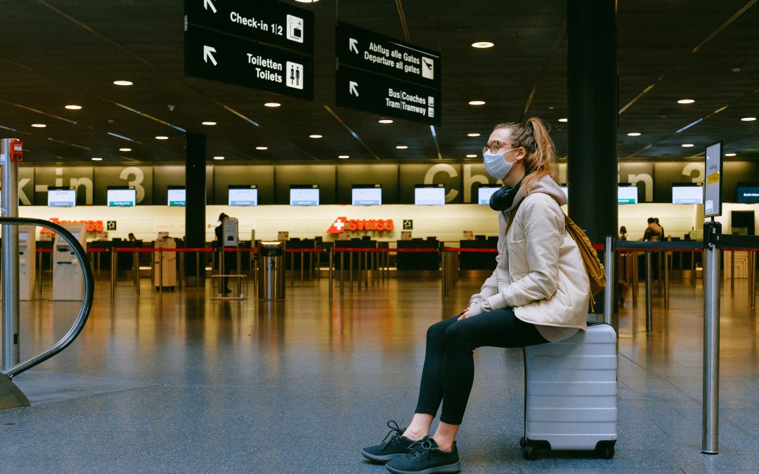 woman-on-luggage-facemask